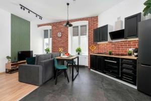 Klimatyczne Studio z Pralką w Łodzi by Noclegi Renters