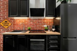 Klimatyczne Studio z Pralką w Łodzi by Noclegi Renters
