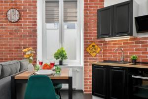 Klimatyczne Studio z Pralką w Łodzi by Noclegi Renters