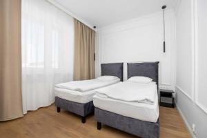 Spacious Apartment with 2 Bedrooms by Noclegi Renters