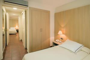 Quadruple Room with Street View room in Hotel Restaurante Capri