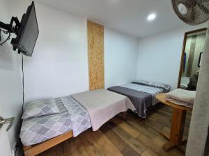 CERRO AZUL Alojamiento Habitación triple con piscina privada