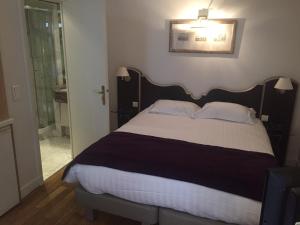 Hotels Hotel Suites Unic Renoir Saint-Germain : photos des chambres