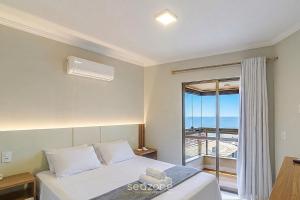 Apto. c Churrasq. e Vista Mar a 70m Praia EM0302