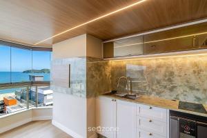 Apto. c Churrasq. e Vista Mar a 70m Praia EM0302