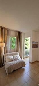 Sunny 1-BR apartment with AC and private terrace near the ocean