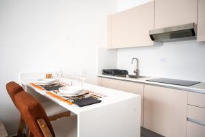 1 bedroom apartment 50m from the sea with Infinity pool