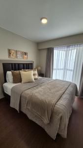 Lovely 1BR condo facing the ocean