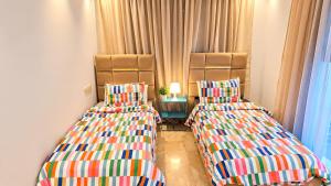 Stylish 3-Bedroom Apartment in Maarif - AC, Fast WiFi & Secure Parking