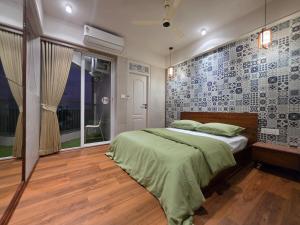 Gulzar Premium Stays - Beach view 2 BHK at Payyambalam - Fully Air-conditioned