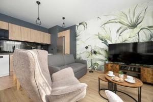 Comfortable Apartment in Warsaw Balcony and Parking by Noclegi Renters