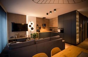 Dwupoziomowy Apartament z Jacuzzi w Szczyrku by Noclegi Renters