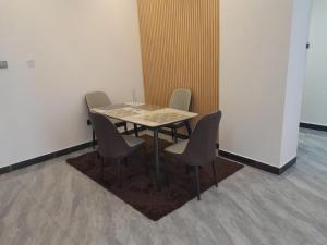 Elegant escape apartment with free parking space,fully equipped gym, swimming pool children playing ground area and amazing city views