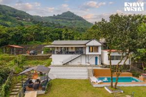 StayVista at Iris Valley with Pool, Mountain View