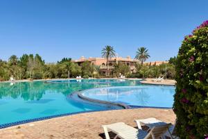 Cozy cocoon with pool view in Palmeraie Village 3