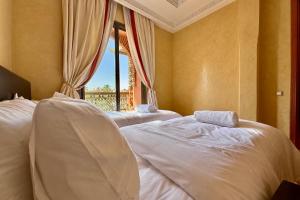 Cozy cocoon with pool view in Palmeraie Village 3