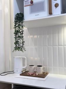 Studio 15 & 19 Cozy Staycation at Mesavirre Garden Residences