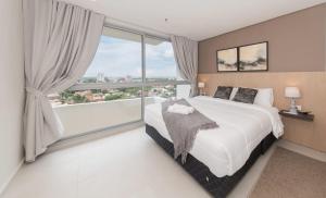 Modern 1BR Mburucuya - Rooftop Pool and Parking