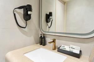 Swirl Transit Hotel by Adani, Navi Mumbai