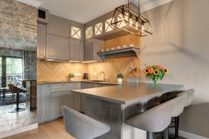 DWIE MOTŁAWY apartments by Staywin