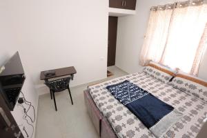 Splendid rooms In Yelahanka near Airport and KIA with Common kitchen 103