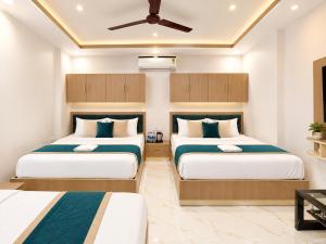 Shree Kashi PV & SV Grand - Premium Spiritual Stay with Lift Near Kashi Vishwanath Dham & Dashshwamedh Ghat