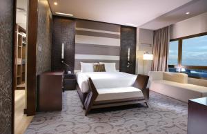 Deluxe Suite - Complimentary Shuttle Bus to Beach & Mall of the Emirates room in Metropolitan Hotel Dubai