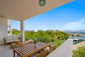 New Listing 2BR condo near the ocean with pool, gym, WiFi, and parking