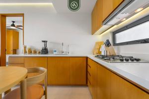 New Listing 2BR condo near the ocean with pool, gym, WiFi, and parking