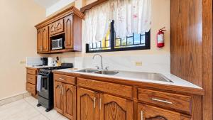 Coastal Dangriga Apartment with AC In-Unit Laundry & Full Kitchen