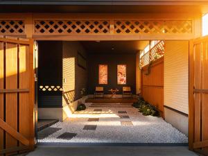 Heart of Ikebukuro 3-Minute Walk from Kita-Ikebukuro Station Zen-Style Courtyard Designed by a Professional 3 Bedrooms LivingDining Room Sleeps 8 Two Bathrooms
