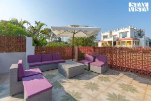 StayVista at The Courtyard Estate with Regal Interiors & Lawn