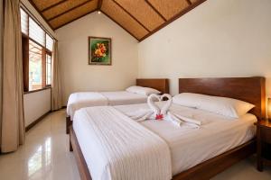 Collection O near Sampalan Harbour formerly Griya Nusa Hotel