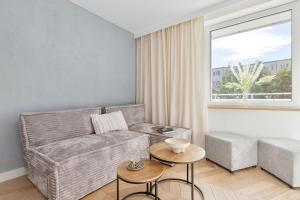 Comfortable Family Apartment with Balcony in Gdynia by Noclegi Renters