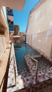 Velora Homes 2BR Apt with Pool & Rooftop Lounge in Masaki
