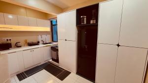 Velora Homes 2BR Apt with Pool & Rooftop Lounge in Masaki