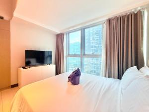 Uptown Parksuites BGC