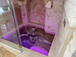 Romantic Stone Suite with Private Whirlpool Tub