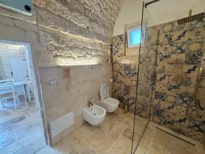 Romantic Stone Suite with Private Whirlpool Tub