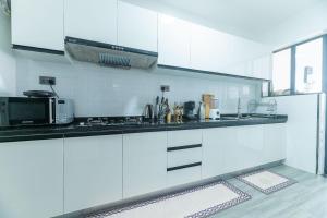 Beautifully furnished apartment with swimming pool ample parking space fully equipped gym child play area and amazing city views