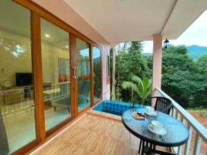 Luxury 2BR Home with Stunning Terrace & Mini Pool
