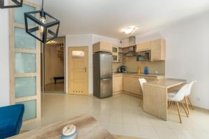 Morskie Oko Apartament z Klimatyzacją Blisko Plaży by Noclegi Renters
