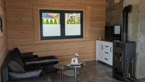 Gemütliches Holzhaus mit Kamin und Naturweitblick