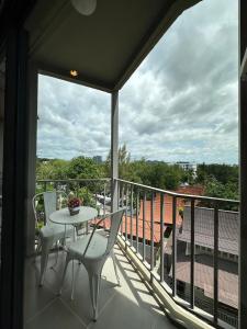 Designer Room with Balcony, Very Close to the Beach