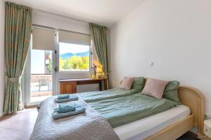 Cosy 2-bedroom apartment near the ski road Bansko