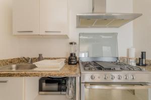 NAUTICA Beachfront 1 BDR with pool by Casa Paraiso