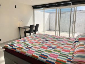 Bonita casa de 2 habitaciones con terraza en casa Oasis Malvas cerca de Plaza Patria - Totalmente adaptado y accesible - Espacio compartido