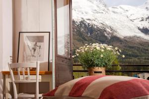 Twin Room with Balcony and View of Mont Blanc room in La Chaumière Mountain Lodge