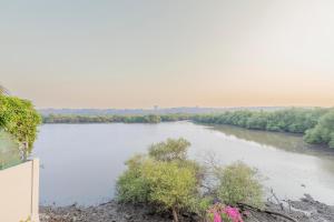 Staymaster Agua De Marra - 2BR Apartment with Shared Pool and River View