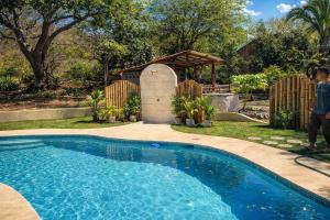 Doble Casita para 4 - Piscina - BBQ - Fogata - Finca a 15 min de San Juan del Sur y Playas